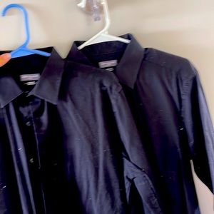 Men’s black dress shirt.  Great for waiters/restaurant.  Van Heusen slim fit.